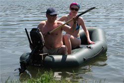 2 persons onboard an inflatable dinghy